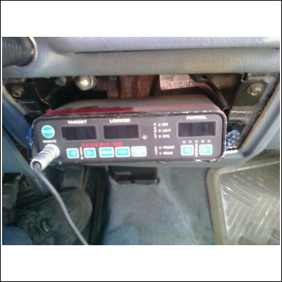 2000 Mercury Grand Marquis - A radar detector is installed in the interior of a vehicle.