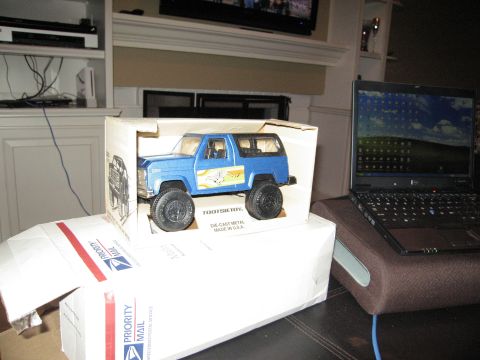 1986 Ford Bronco - A blue Tootsietoy die-cast truck is shown inside its original packaging.