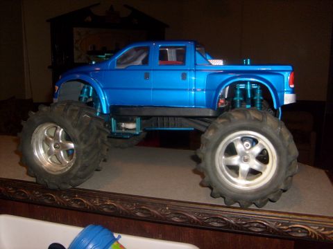 1989 Ford Bronco - This remote-controlled truck features oversized tires and a bright blue paint job.