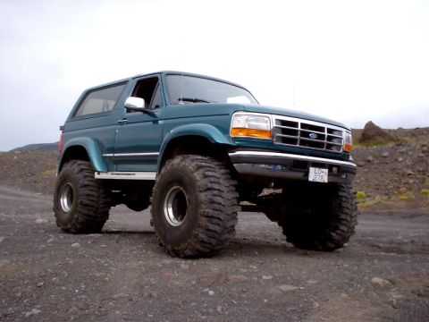 1996 Ford Bronco - This 1996 Ford Bronco is equipped with massive off-road tires, giving it a lifted appearance.