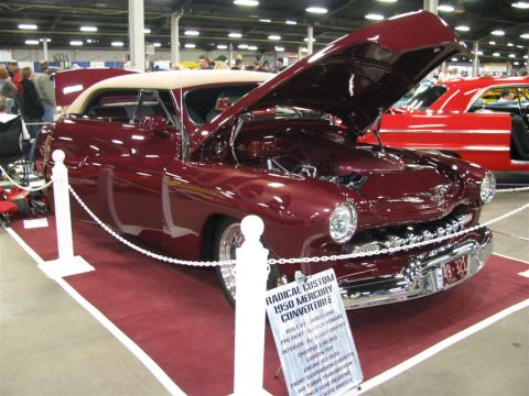 2003 Mercury Marauder - A custom 1950 Mercury convertible is displayed with its hood open, showing off its engine.