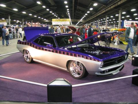 2003 Mercury Marauder - Customized 1970 Plymouth Barracuda displayed at a car show with its hood open.