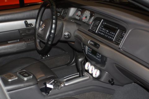 2003 Mercury Marauder - Interior view of a 2003 Mercury Marauder, the dashboard, steering wheel, and center console.