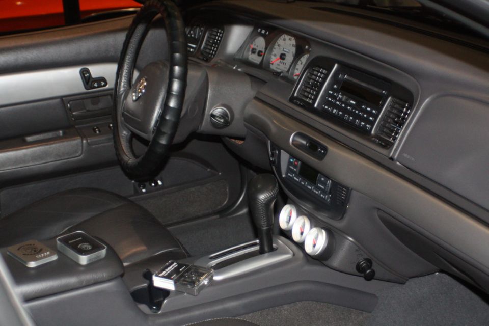 2003 Mercury Marauder interior showing dashboard, steering wheel, center console with shifter and gauges