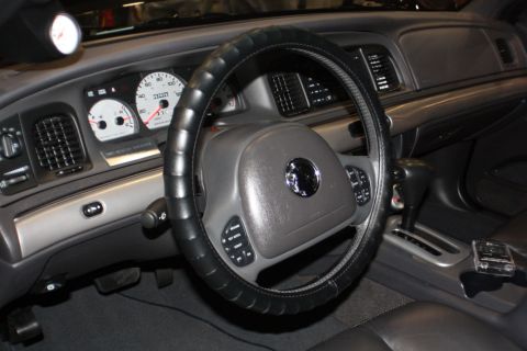 2003 Mercury Marauder - The interior of a 2003 Mercury Marauder, its distinctive dashboard and steering wheel.