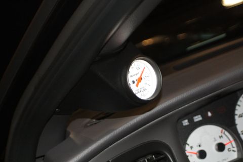 2003 Mercury Marauder - Interior view of a car's dashboard with an aftermarket air-fuel ratio gauge.