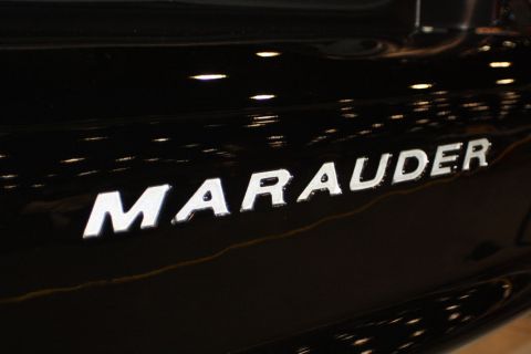 2003 Mercury Marauder - The "MARAUDER" badge is visible on the side of a black vehicle. The year is not discernible from this image.