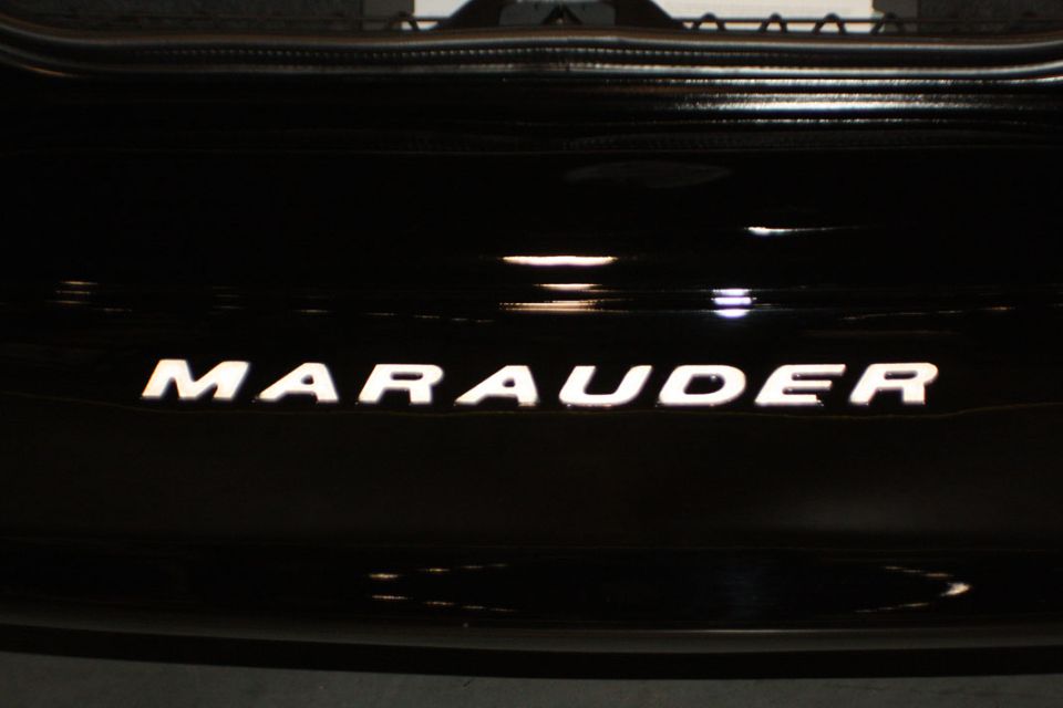 Rear of a 2003 Mercury Marauder with illuminated 'Marauder' badge