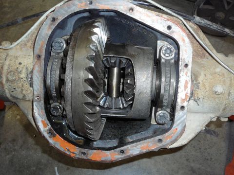 1991 Ford Bronco - Close-up view of an open differential assembly, showing internal gears and housing.