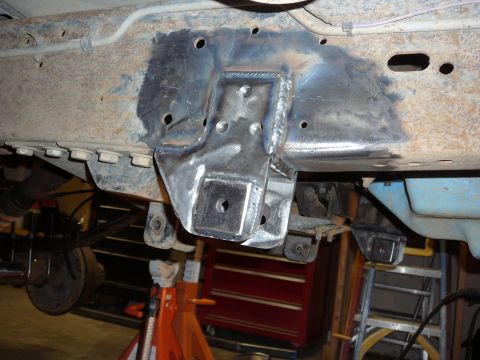 1991 Ford Bronco - Custom suspension bracket welded onto a vehicle frame, likely for a modification project.