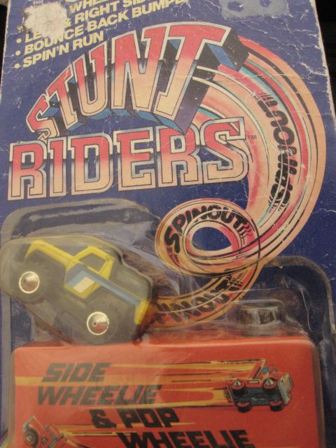 1986 Ford Bronco - Toy stunt vehicle packaged for sale, the 'Stunt Riders' branding and action descriptions.