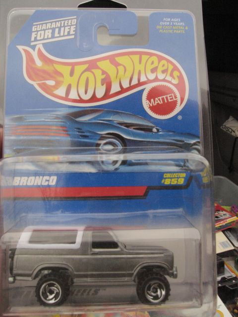 1986 Ford Bronco - A Hot Wheels diecast Bronco is packaged with collector number 859.