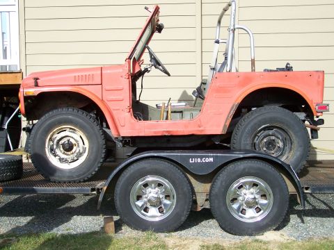 1988 Suzuki Samurai - This 1988 Suzuki Samurai is seen on a trailer, missing its doors and top.