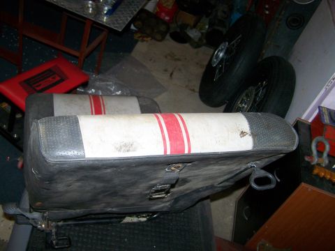 1988 Suzuki Samurai - These seats, possibly from a 1988 Suzuki Samurai, feature a distinctive black, white, and red stripe design.