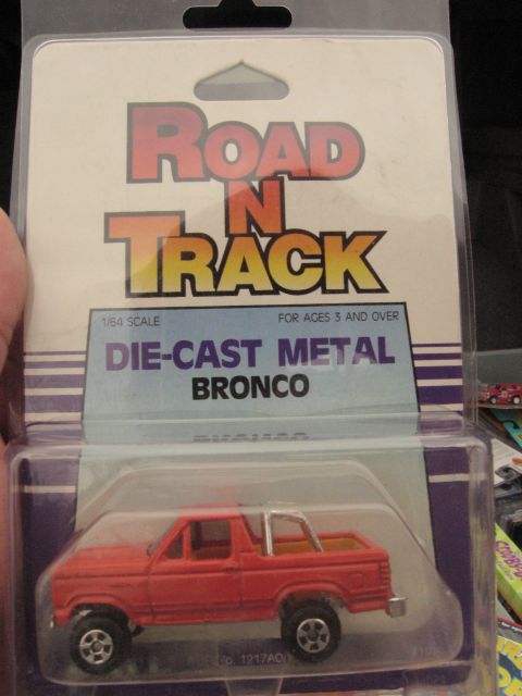 1986 Ford Bronco - This die-cast metal Bronco toy is packaged with a "Road N Track" label.