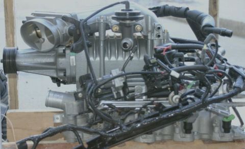 2007 Ford Mustang - A disassembled supercharger assembly is shown, detached from any vehicle.