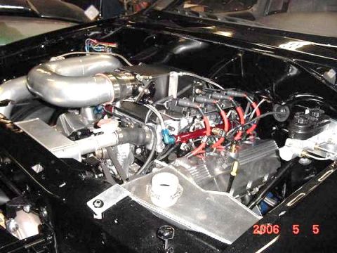 2007 Ford Mustang - Close-up of a modified engine bay, custom plumbing and wiring. The photo was taken on May 5, 2006.