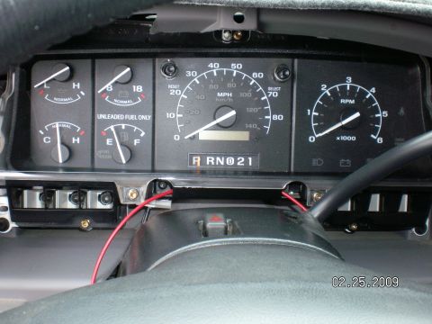 1996 Ford Bronco - Ran the power wire through the bottom of the cluster so it wouldn't get pinched when I tilt the wheel, and over to the new switch location.…