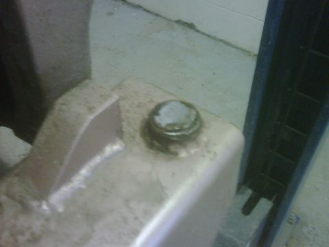 1996 Ford Bronco - A close-up view of a spindle nut, likely part of a larger mechanical assembly.
