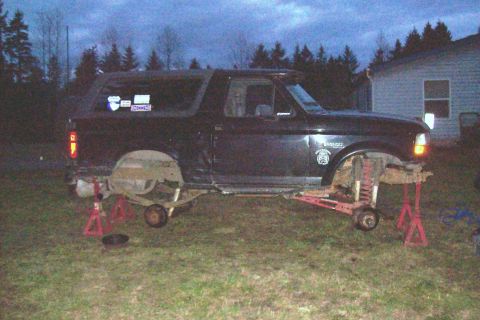1995 Ford Bronco - This 1995 Ford Bronco is elevated on jack stands, with its wheels off for maintenance.