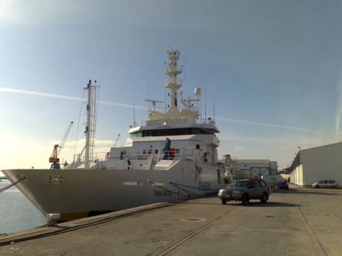 1991 Ford LTD Crown Victoria - Photograph of the docked research vessel Thalassa, not a technical document.