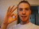 1990 Ford Taurus - A man is shown giving the ok sign.