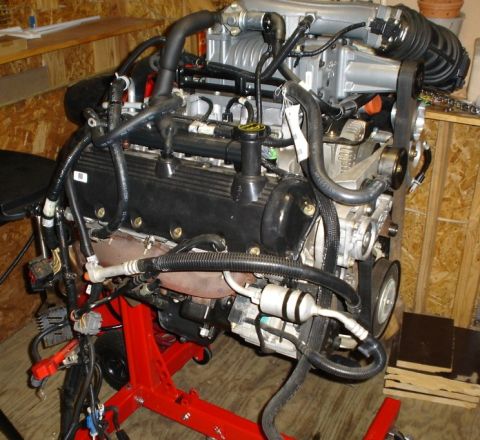2007 Ford Mustang - Photograph of a complete Ford V8 engine on a stand, not a technical document.