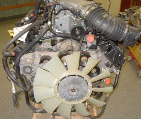 2007 Ford Mustang - Photograph of the front of a Ford V8 engine showing the fan and accessory drive, not a document.