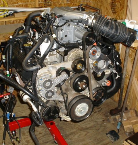 2007 Ford Mustang - Photograph of a Ford V8 engine showing the accessory drive side, not a technical document.