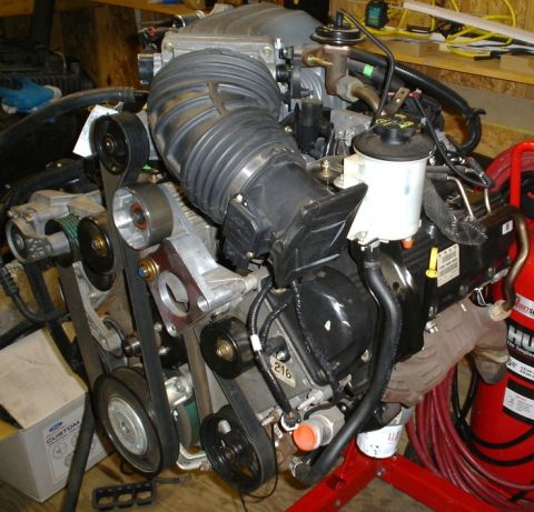 2007 Ford Mustang - Photograph of a supercharged Ford V8 engine assembly, not a technical document.