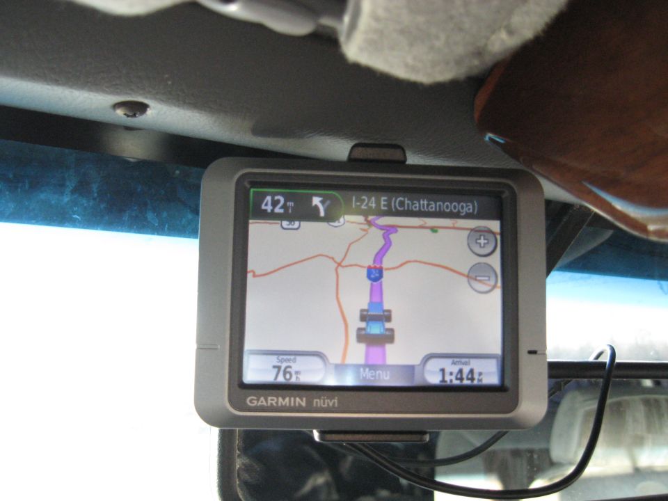 Garmin nuvi GPS unit mounted in a vehicle showing a map