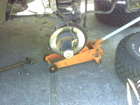 1995 Ford Bronco - First order of business Disconnect the ABS from the wheel wells and secure them around the front disc's