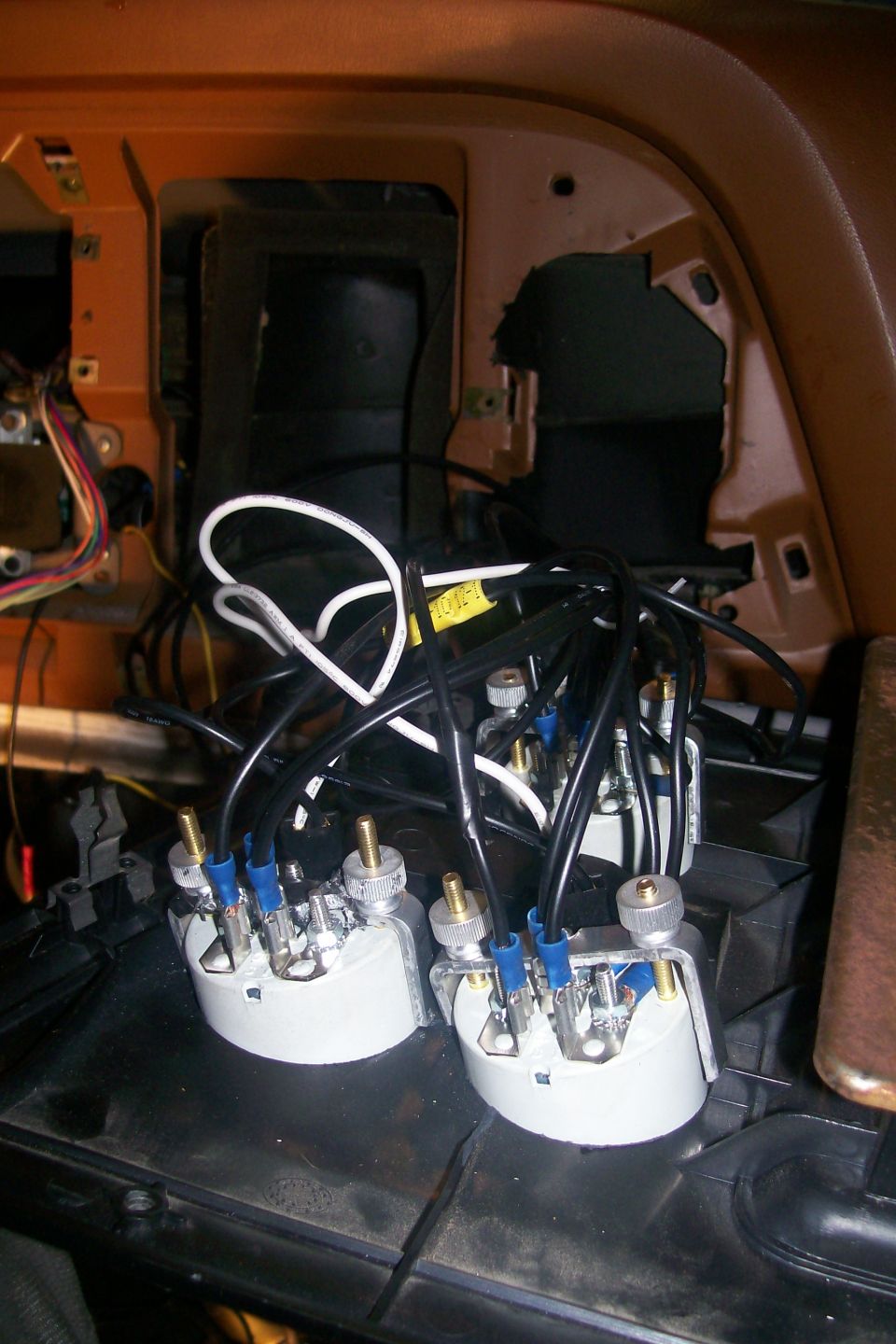 Wiring and connectors for two dashboard gauges in a vehicle.