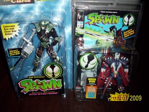 1991 Ford Bronco - Collectible Spawn action figures and special edition comic books are displayed in their original packaging.