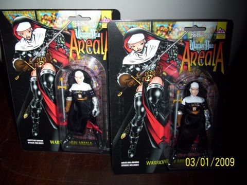 1991 Ford Bronco - Two collectible action figures, labeled 'Warrior Nun Areala', are displayed in their original packaging.