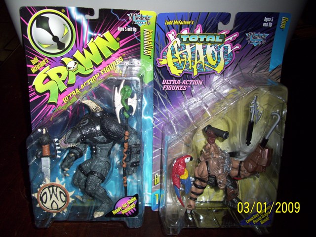 Spawn and Total Chaos action figures in packaging