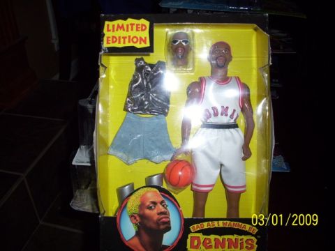 1991 Ford Bronco - Dennis Rodman action figure in original packaging, dated 03/01/2009.
