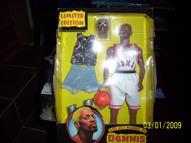 Dennis Rodman action figure with basketball and alternate outfit, in box labeled Limited Edition