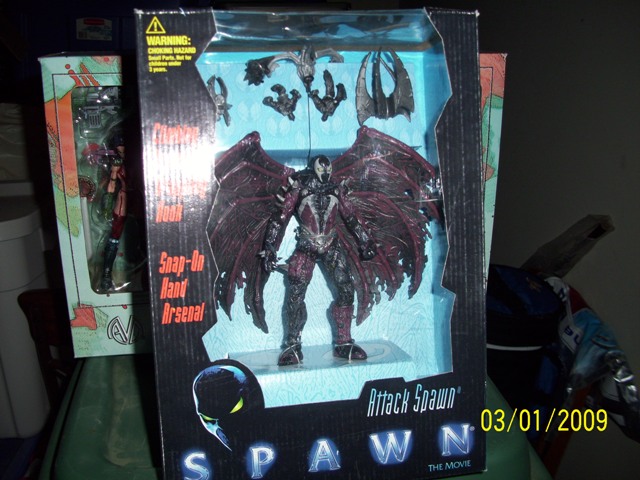 Spawn action figure in box with wings and accessories, dated 03/01/2009