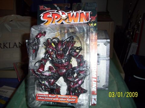1991 Ford Bronco - A Spawn action figure is displayed in its original packaging, with a date stamp of 03/01/2009 visible.