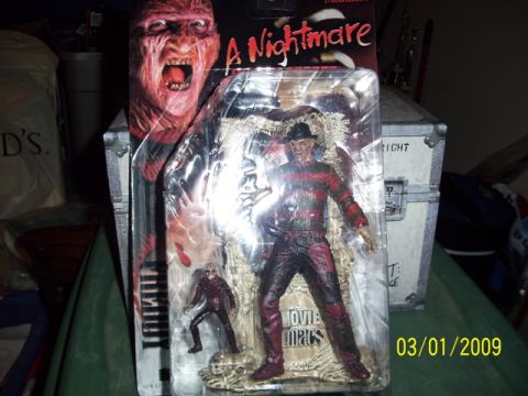 1991 Ford Bronco - A Freddy Krueger action figure is displayed in its original packaging, with a date stamp of 03/01/2009 visible.