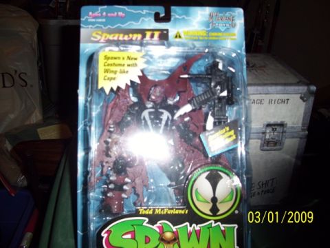 1991 Ford Bronco - Spawn II action figure in its original packaging, a new costume with a wing-like cape.
