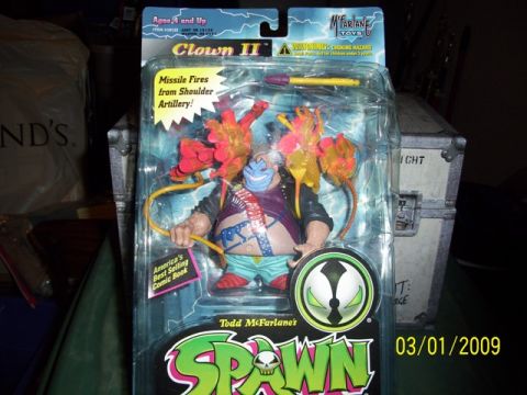 1991 Ford Bronco - Clown II action figure from Todd McFarlane's Spawn series, packaged with accessories and comic book mention.