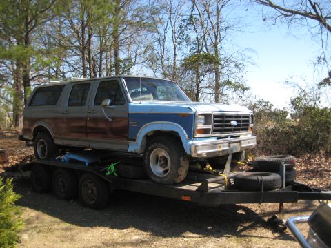 1986 Ford C-350 (Centurion Conversions) - A Ford Bronco Centurion conversion is transported on a trailer.