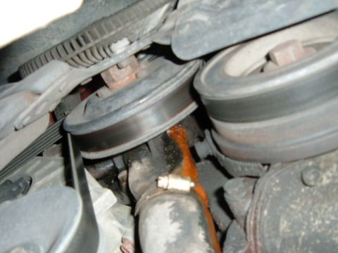 1988 Ford Bronco - leaky water pump. you can see the weap hole if you look close.