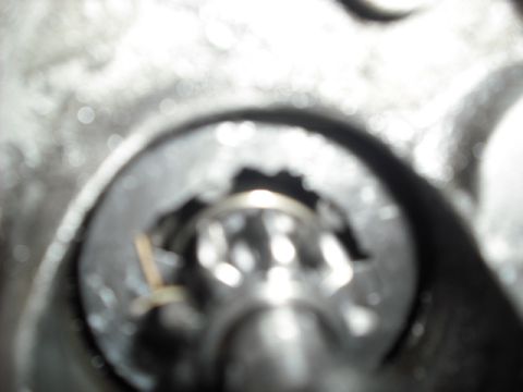 1979 Ford Bronco - Damaged metal part with internal teeth and a retaining ring visible.