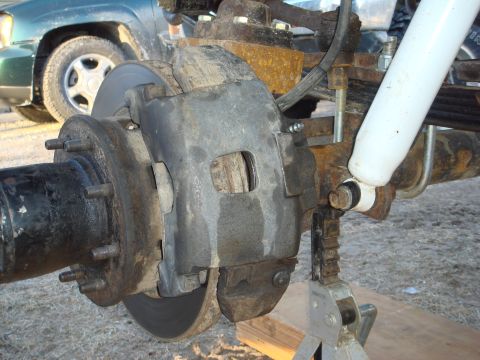 1978 Chevrolet C/K Pickup - This photo shows a heavy-duty truck's brake caliper and rotor assembly, not a 1978 Chevrolet C/K Pickup.