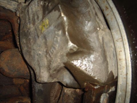 1978 Chevrolet C/K Pickup - Close-up view of a Dana 60 axle housing, showing casting marks and the SuperMotors.net watermark.