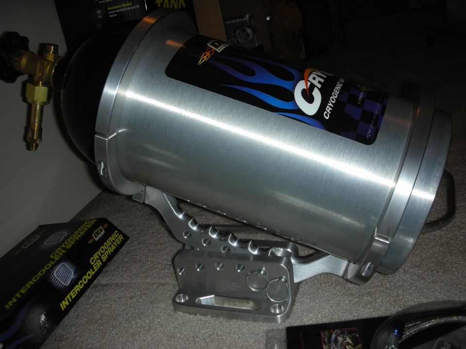 Silver cryogenic intercooler sprayer tank with brass valve on bracket, with product box.