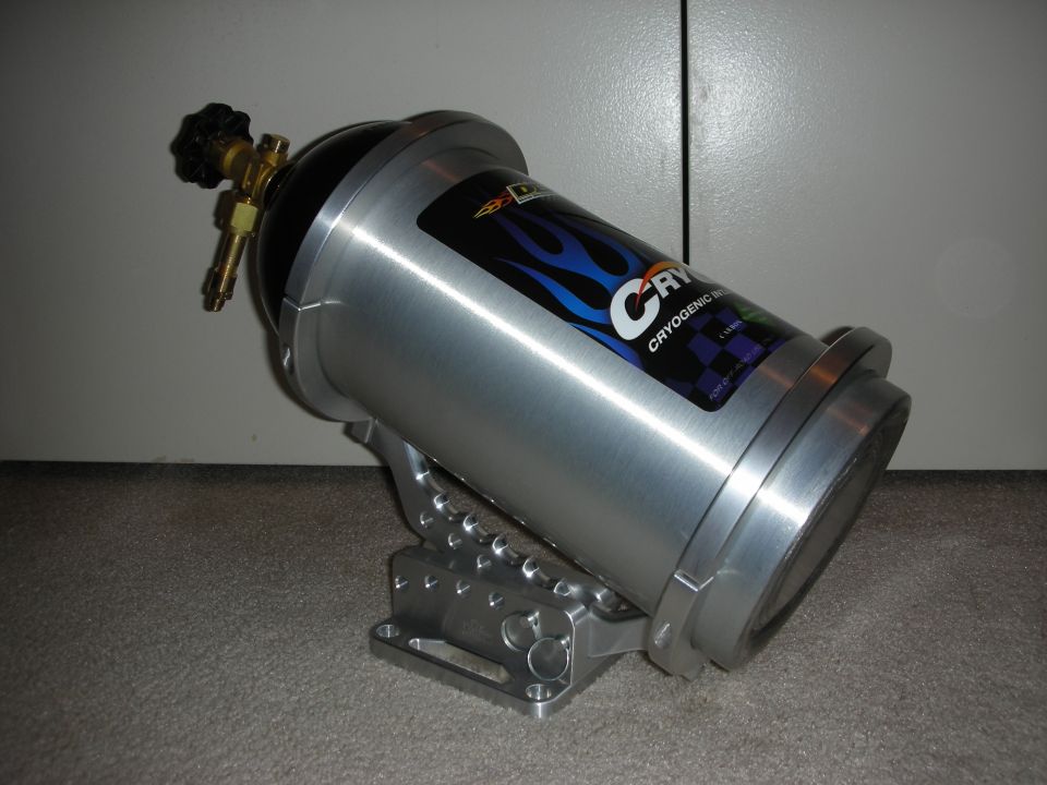 Polished aluminum cryogenic tank with blue flame label on a silver bracket.
